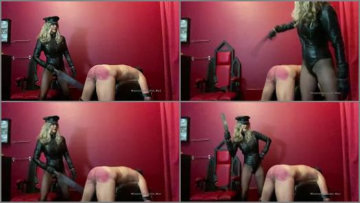 Rubber Strap – Domina Scarlet starring in video ‘Severe Strapping In Leather’