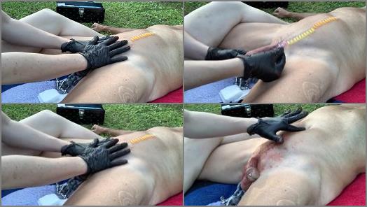 Ball Stomping – Mistress Adeline starring in video ‘Skewer removal’
