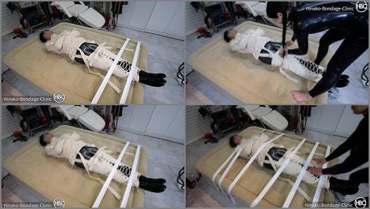 Femdom Stream – Hinako Bondage Clinic – Taped Down to the Bed in a Latex Cat Suit and Canvas Straitjacket