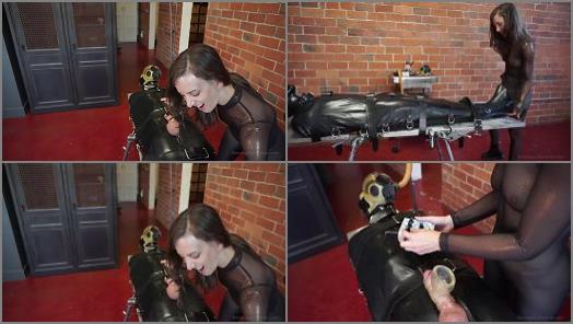 Submissive – Elise Graves Bondage Liberation – Bag of Tricks – Ruckus and Elise Graves – Sexy Ruckus is Bound in Rubber Sleep Sack, Gas Mask and Completely at Elise’s Mercy