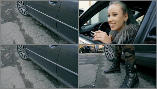 Boot Fetish – ‘Anette smoking in her car’ of ‘Cruel Anettes Fetish Store’ studio