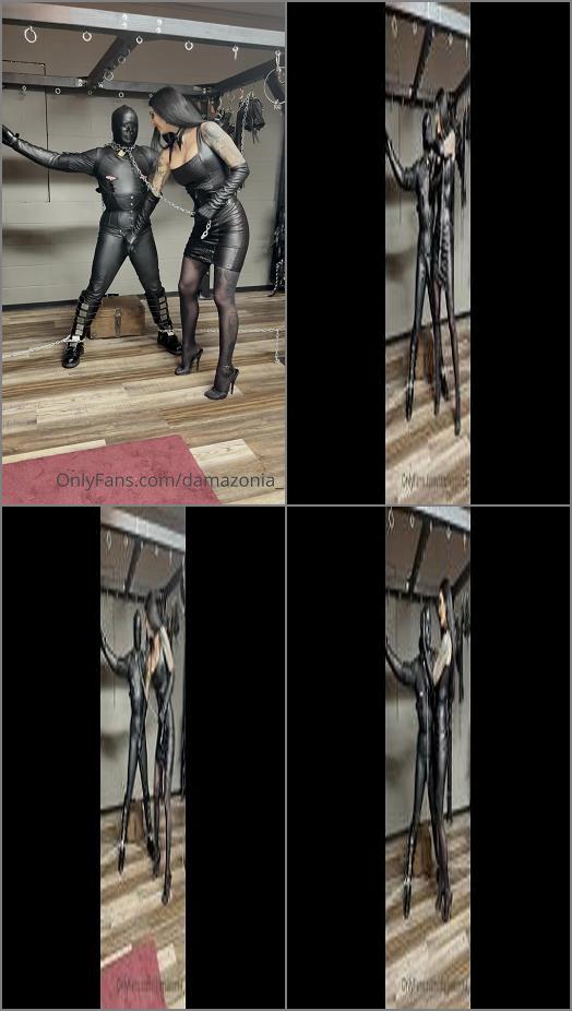 Damazonia  Teasing my leather gimp seems to bring a smile on my face preview